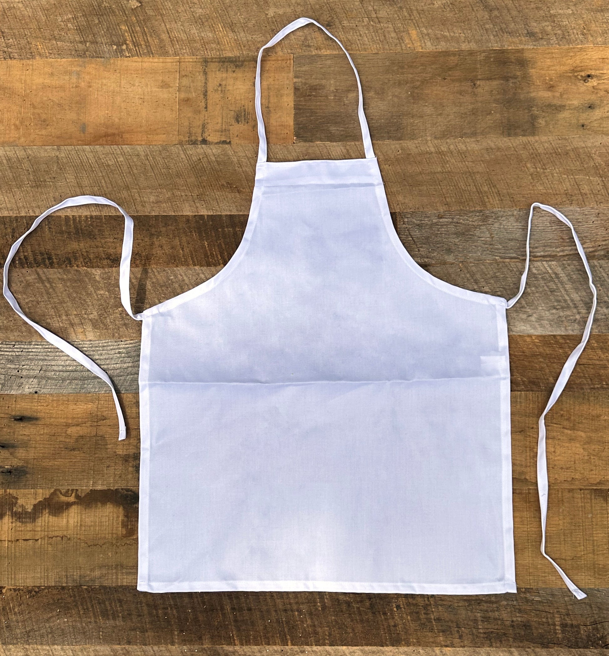White apron on a wooden surface