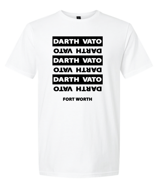 A white short-sleeve crewneck t-shirt featuring a black graphic print on the front. The graphic consists of five stacked horizontal black bars with the text 'DARTH VATO' printed upside down inside each bar, and 'FORT WORTH' printed below in a clean sans-serif font.