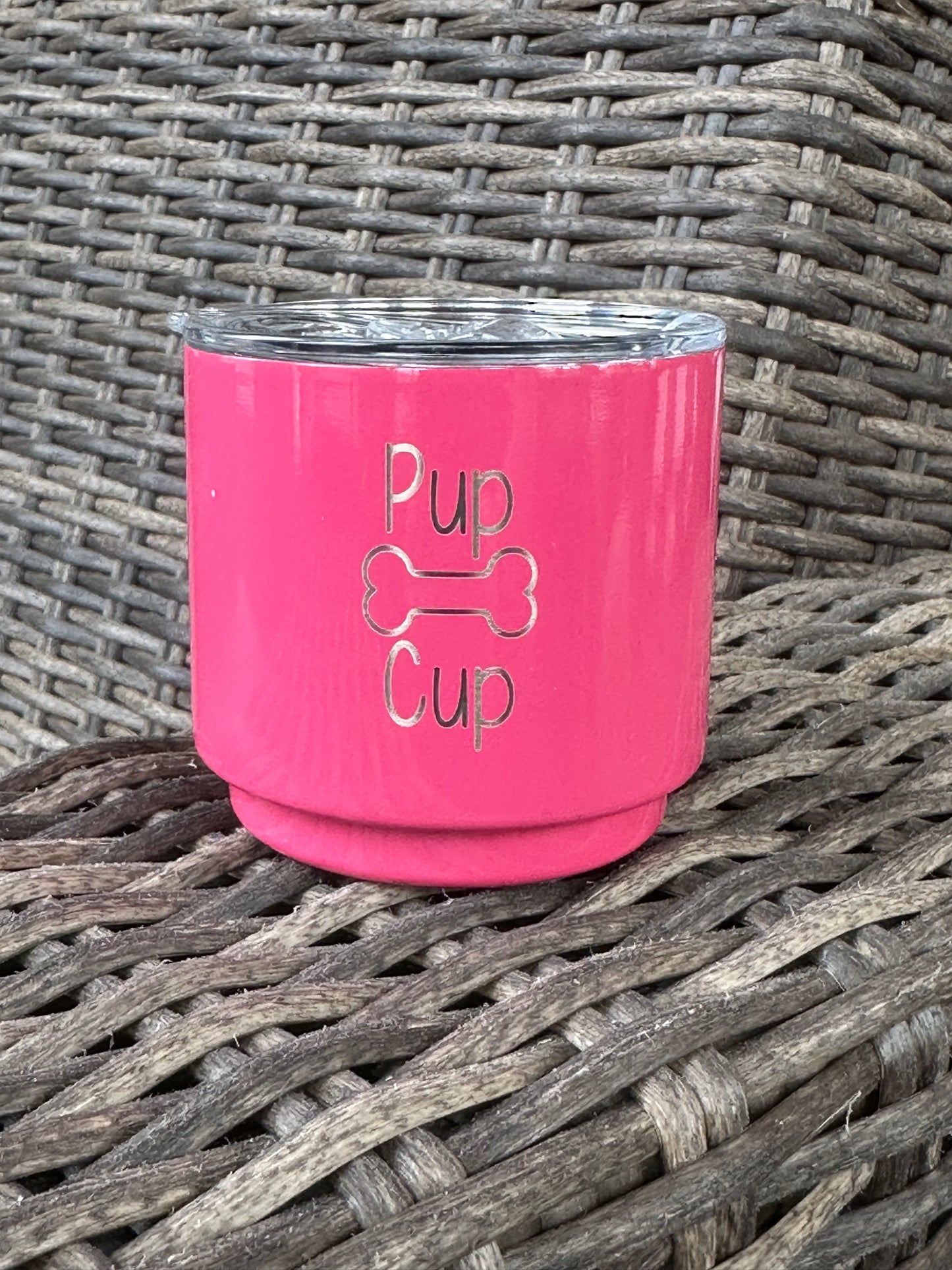 a hot pink pup cup