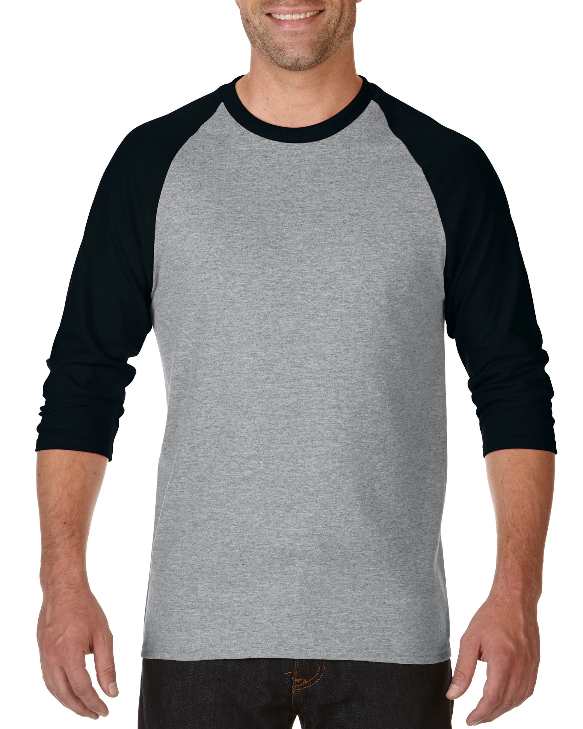An adult male wearing a 3/4 sleeve raglan t-shirt in a gray color with a black collar, showcasing a classic fit.