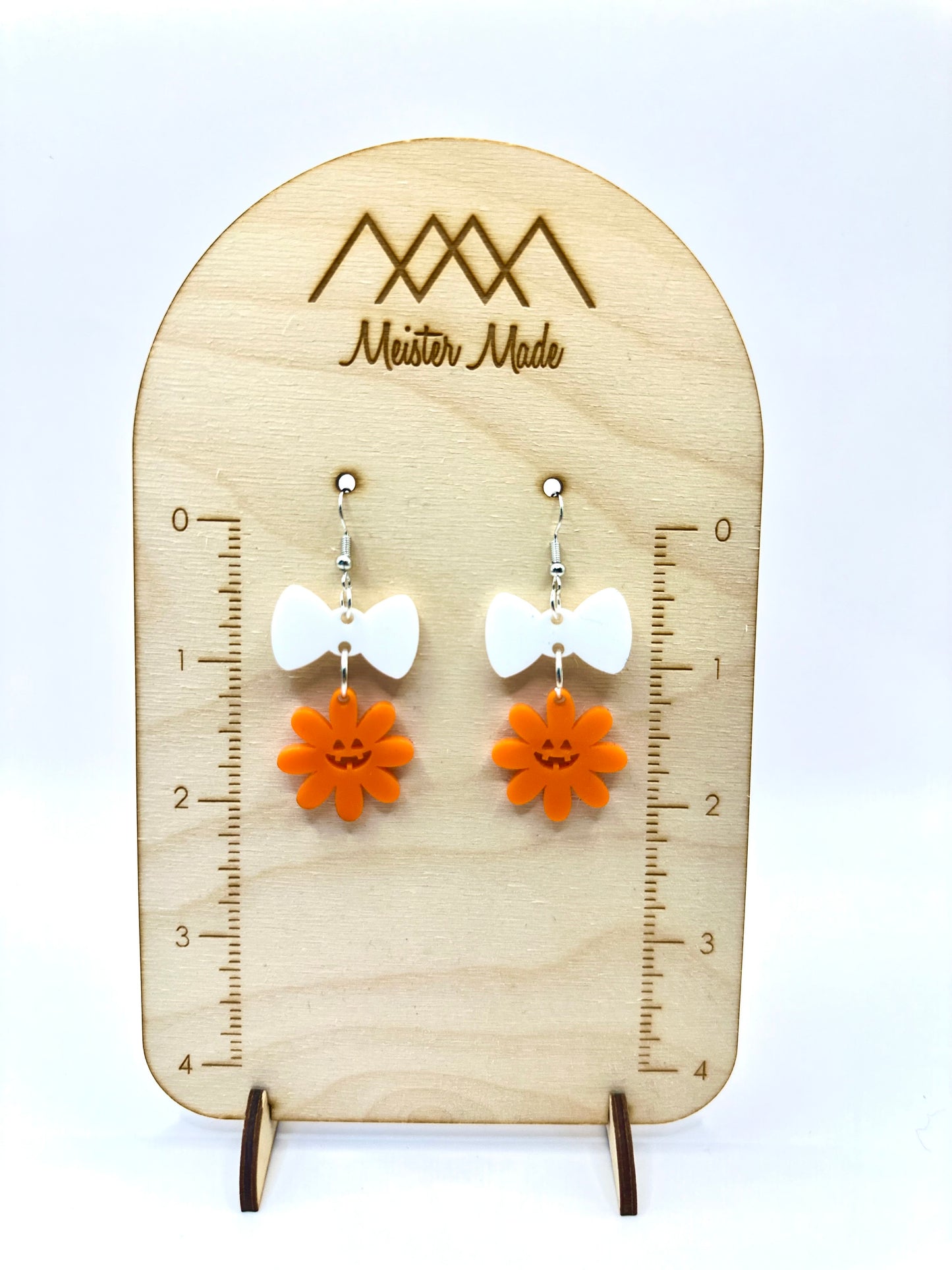 Spooky-Faced Flower Bow Dangle Earrings