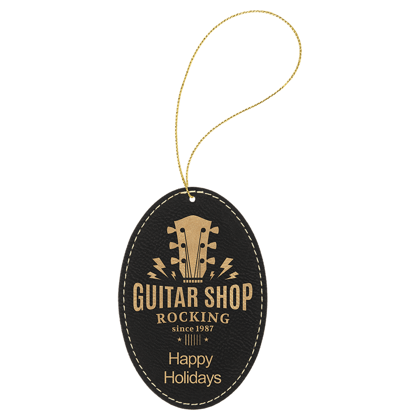 A black vegan leather oval ornament with gold engraving